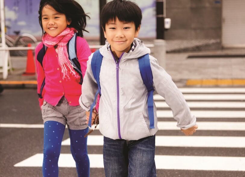 Asian children walking